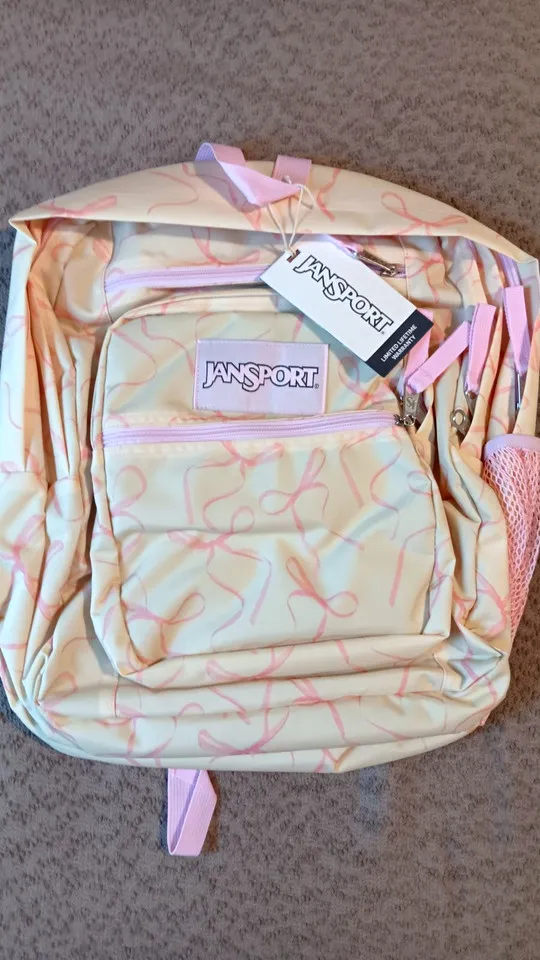 JanSport Big Student Backpack Natural/Pink Bow Print Bottle Pocket JS0A47JKA8K