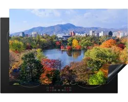 KitchenYeah® Inductie beschermer 81x52 cm - Herfst valt over het Odori Park in het centrum van Sapporo in Japan - Kookplaataccessoires - Afdekplaat voor kookplaat - Inductiebeschermer - Inductiemat - Inductieplaat mat