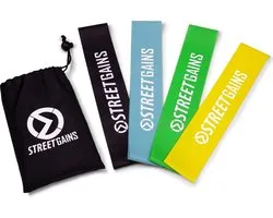 StreetGains® Mini Bands Set – 4 Rubberen Booty Bands (Light, Medium, Strong, Extreme) – Duurzaam Latex Rubber voor Krachttraining, Warming-up en Revalidatie – Inclusief Opbergtasje