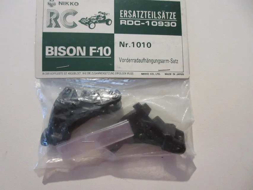 NIKKO RC RICAMBIO PER RHINO BISON F-10 FRONT SUSPENSION ARM SET No 1010