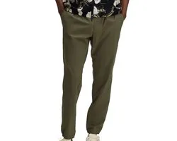Under armour vibe woven trainingsbroek in de kleur groen.