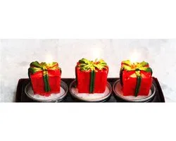 Kerstkaars in cadeauverpakking