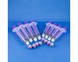 Seringue (s) d’alimentation pour colostrum / lait maternel avec capuchon étanche